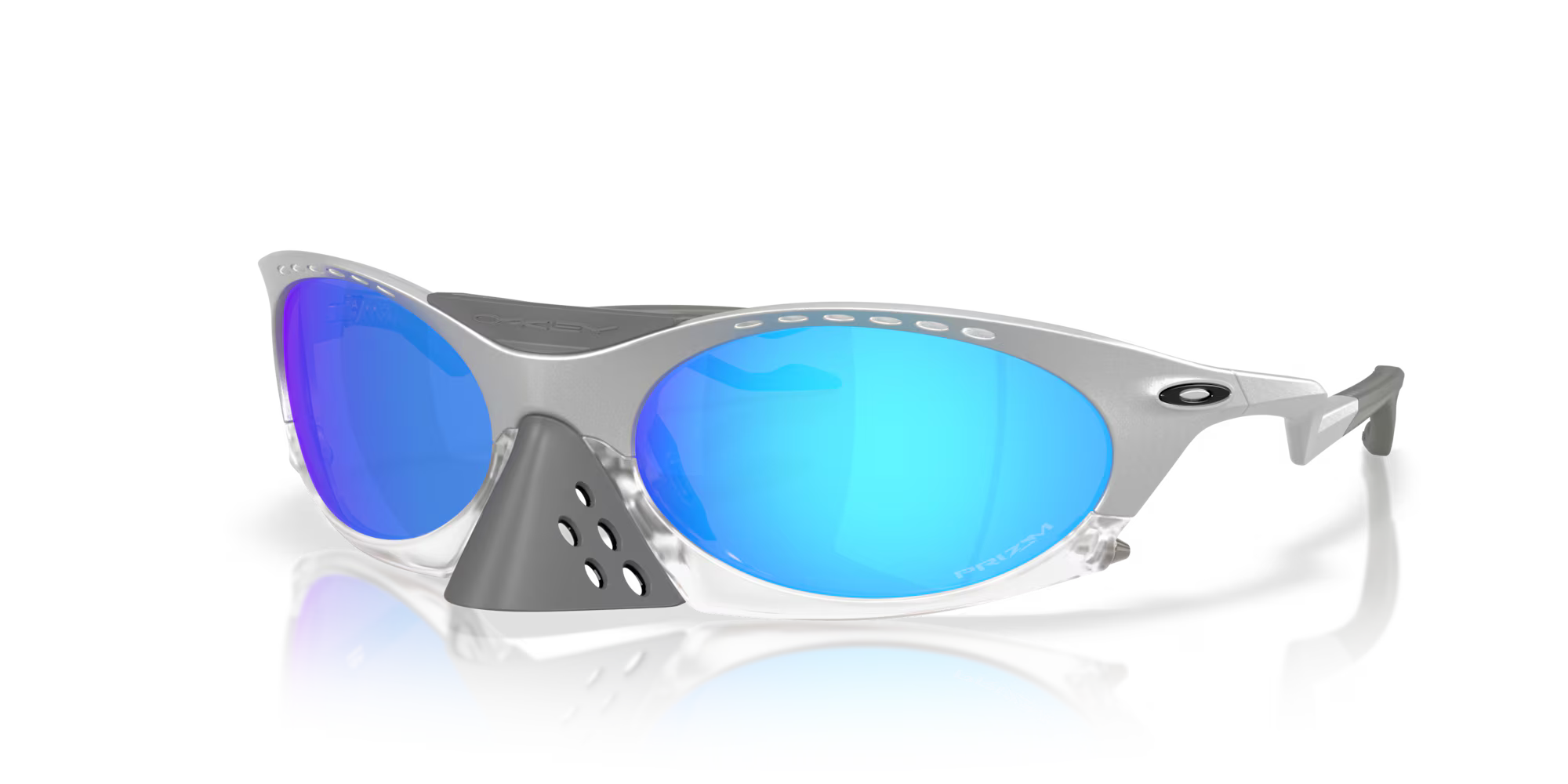 The Plantaris X-Silver Frame by Machina - Wearable Technology features silver futuristic sunglasses with blue mirrored lenses, black arms, a large gray vented nose bridge, and adjustable temples with the logo. Displayed on a reflective white surface.