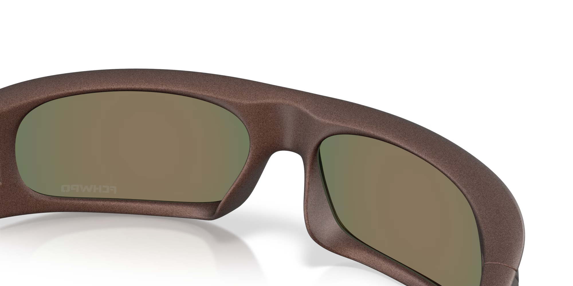 Close-up of brown sunglasses from the Highland Jaylen Brown Signature Series by Machina - Wearable Technology, featuring thick frames, dark green tinted lenses, and a subtle white logo on the left lens against a plain white background.