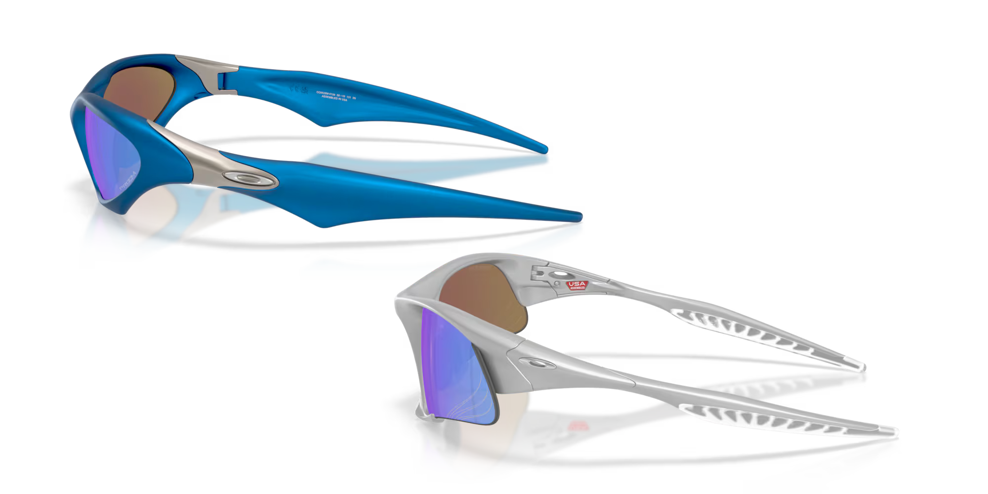Two pairs of MUZM Scar & Suture Jacket® sunglasses by Machina - Wearable Technology: mirrored blue lenses, one metallic blue frame, the other silver—both with aerodynamic designs, ideal for collectors and Suture Jacket® fans.