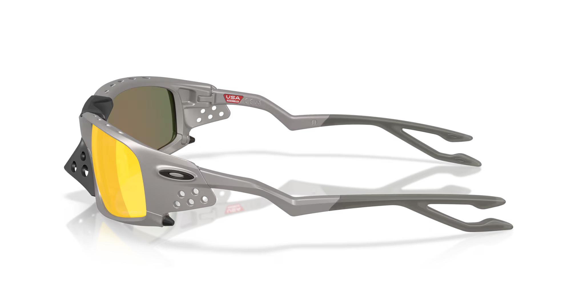 Gray Plantaris SQ Titanium Frame sunglasses by Machina – Wearable Technology, featuring yellow-tinted square lenses, vented side shields and nose piece, angular arms with a cut-out design. Brand logo and USA sticker visible on frame.