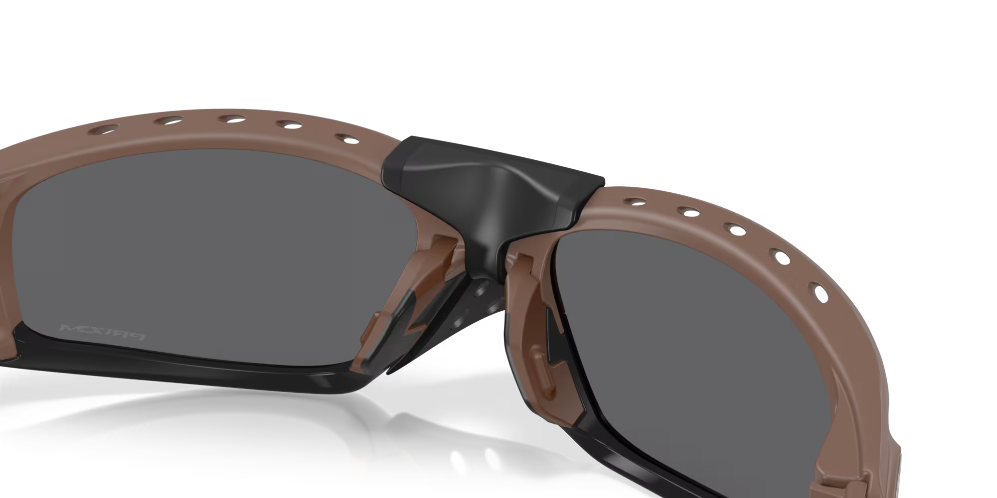 Close-up view of Machina - Wearable Technology Plantaris SQ Matte Mahogany sunglasses with square lenses, black Unobtainium accents, frame vent holes, and dark tinted lenses, shown against a white background.
