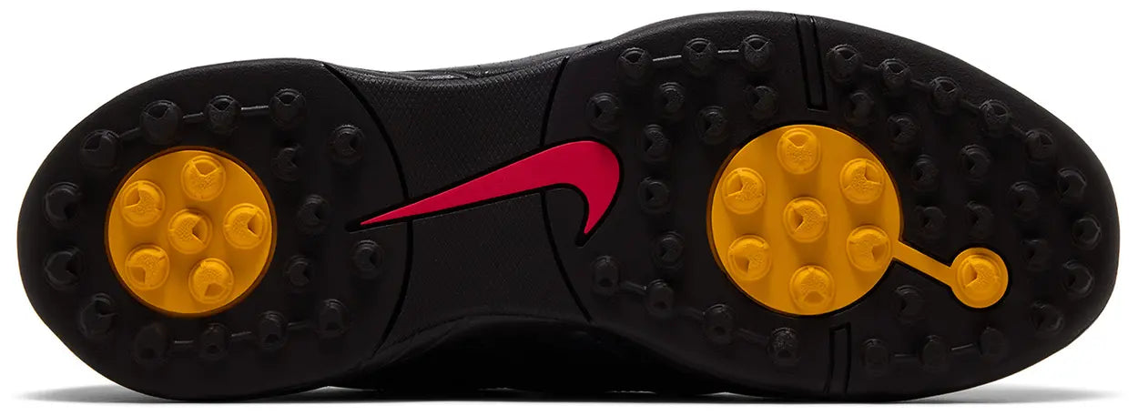 The sole of the Kids of Immigrants x Nike T-90 Mule 'Velvet Brown' by Machina Wearable Technology features a red Nike swoosh at the center and two yellow circular grip areas with raised studs on the forefoot and heel.