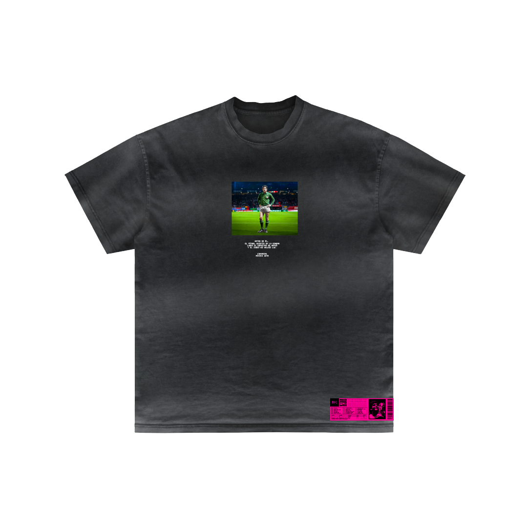 The "Camarena La Leyenda" black t-shirt by Machina - Wearable Technology features a soccer player photo on the chest, white text below, and a pink label—honoring color TV pioneer Guillermo González Camarena.