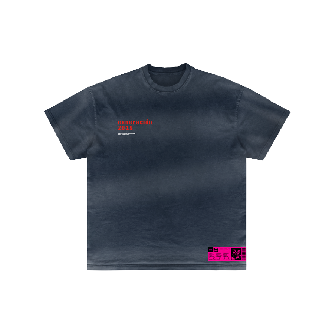 A dark gray Los Cristianos 2015 t-shirt by Machina - Wearable Technology, featuring small red "generación 2015" text on the left chest and a pink rectangle with graphics near the bottom right hem.