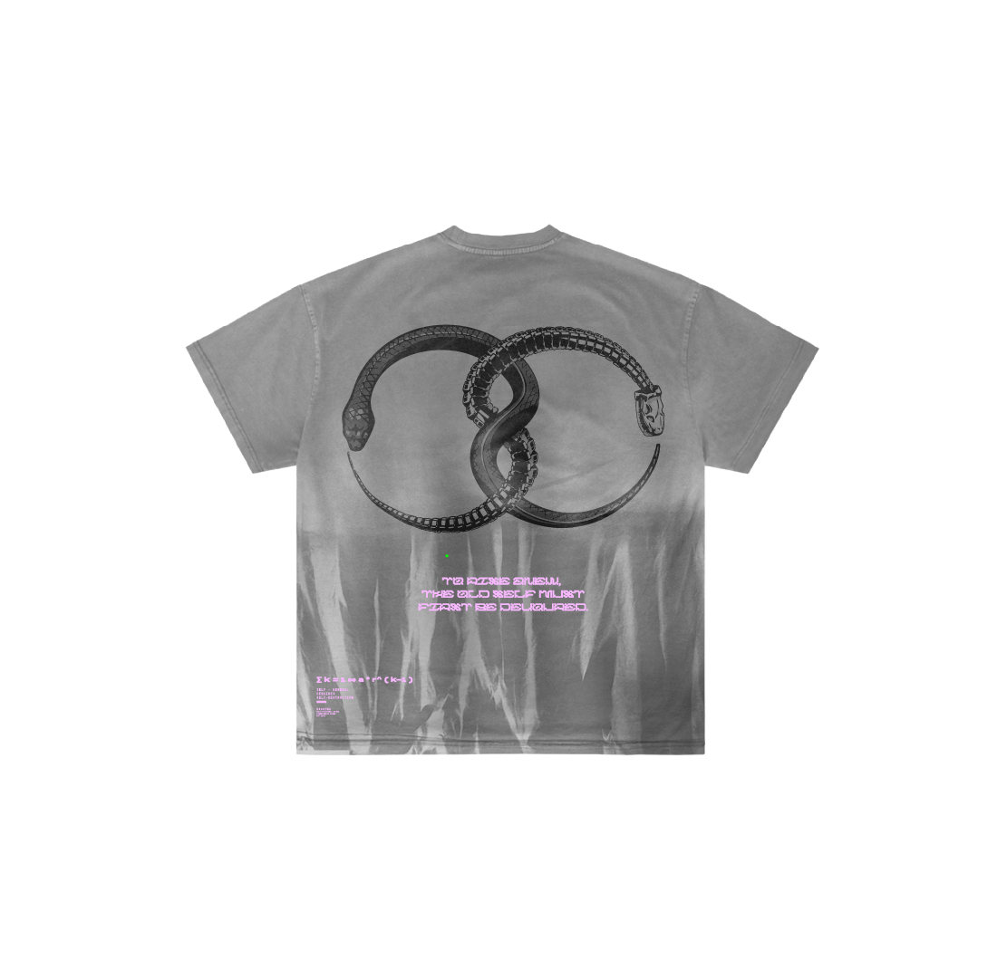The El Ocho t-shirt by Machina - Wearable Technology is hand-dyed luxury cotton in gray, with a bold black Ouroboros serpent—two intertwined snakes forming an infinity symbol—on the back, and small white and pink text near the bottom.