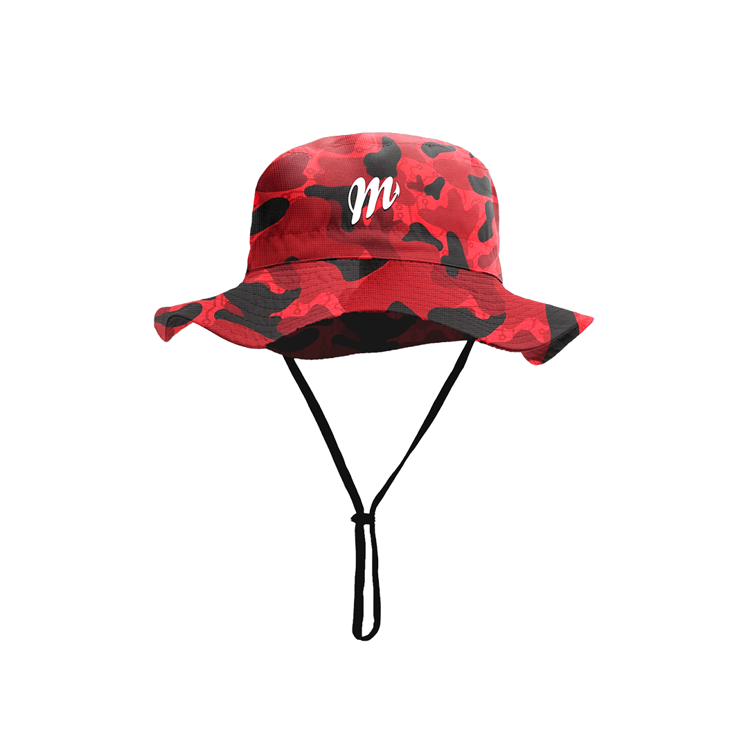 Presenting the Diablo Bucket Hat by Machina - Wearable Technology: a vibrant red camouflage bucket hat crafted to provide excellent protection against the sun. This fashionable accessory includes a wide brim, a secure black chin strap, and is adorned with an eye-catching white letter M on the front.