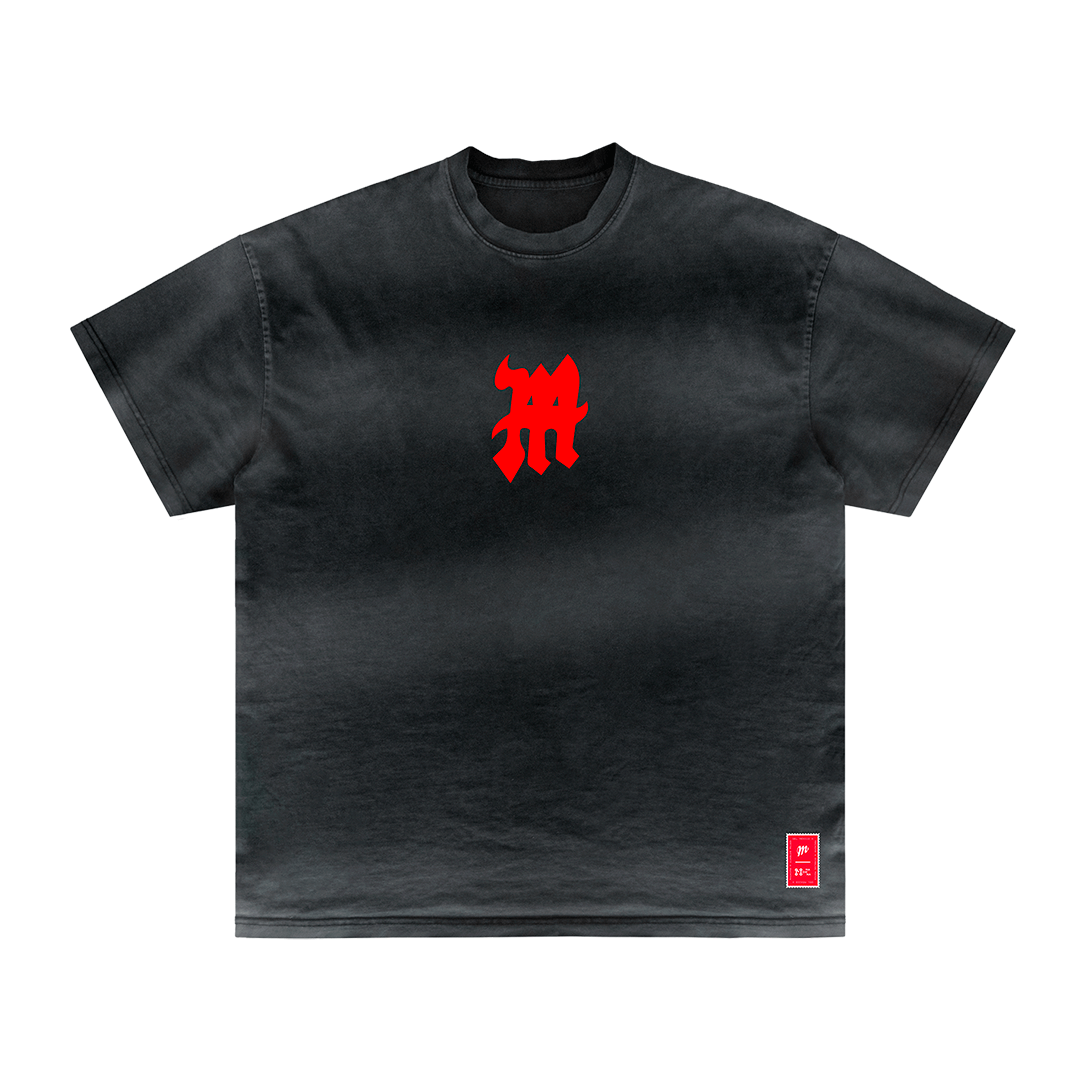 The Comeback t-shirt from Machina - Wearable Technology is a black tee featuring a striking red logo in the center and a small red tag near the bottom hem. With an abstract, stylized emblem that conveys resilience, its dynamic design makes it truly stand out.