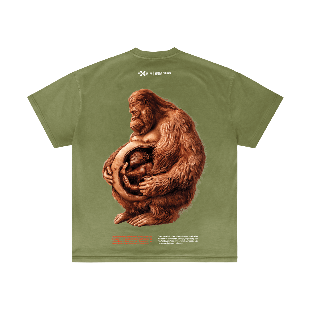 A shirt from Machina - Wearable Technology, in green, features a striking artwork depicting a large orangutan holding a smaller one curled into the shape of an egg. Text at the bottom integrates Gigas Pithekos lore into the design.