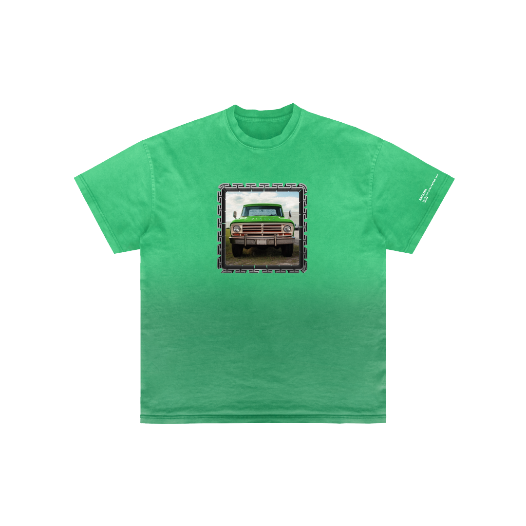 This limited edition green T-shirt, the La Bronco Apa by Machina - Wearable Technology, features a vintage car image on the front, framed with a patterned border.