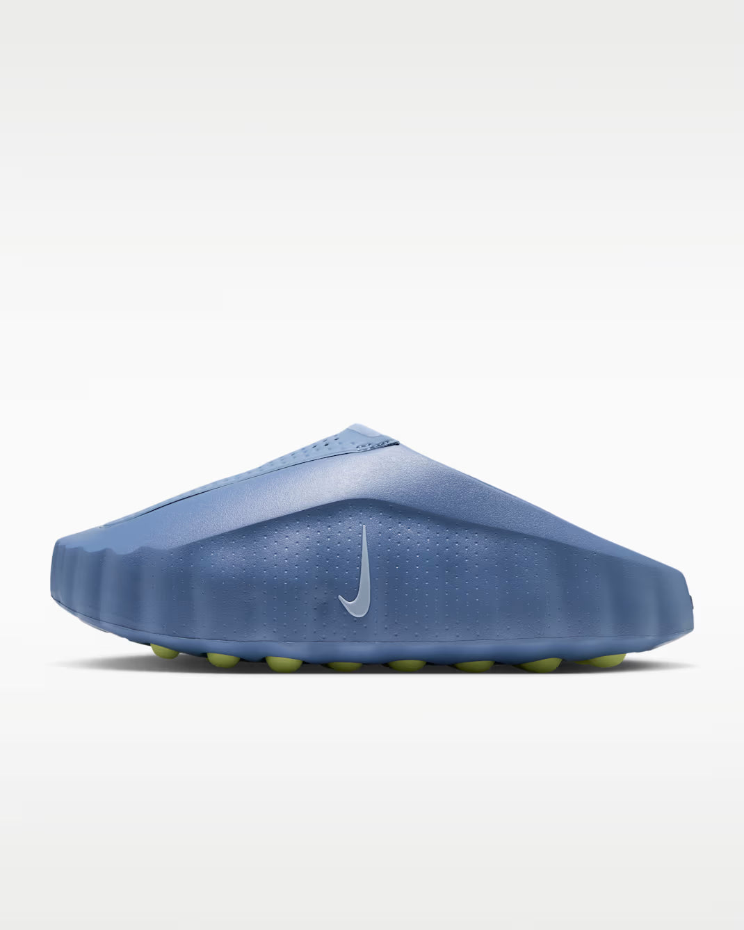 Blue Machina Wearable Technology Mind 001 slip-on sensory sneakers featuring a textured upper, a small swoosh logo, and green studs on the sole.