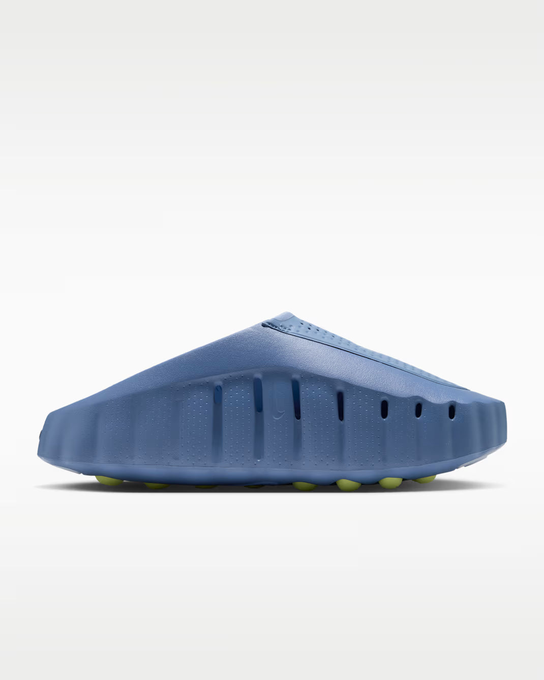 Blue molded Machina Wearable Technology Mind 001 sensory sneakers with a ridged side profile and yellow circular tread on the sole.