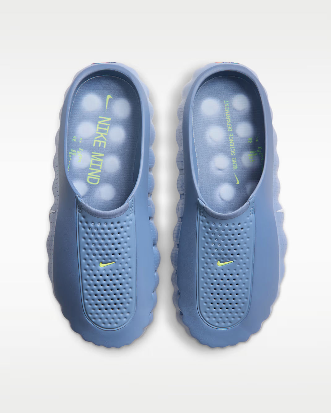 Perforated blue Machina Wearable Technology Mind 001 comfort footwear with lime green logos and NIKE MIND printed on the footbeds.