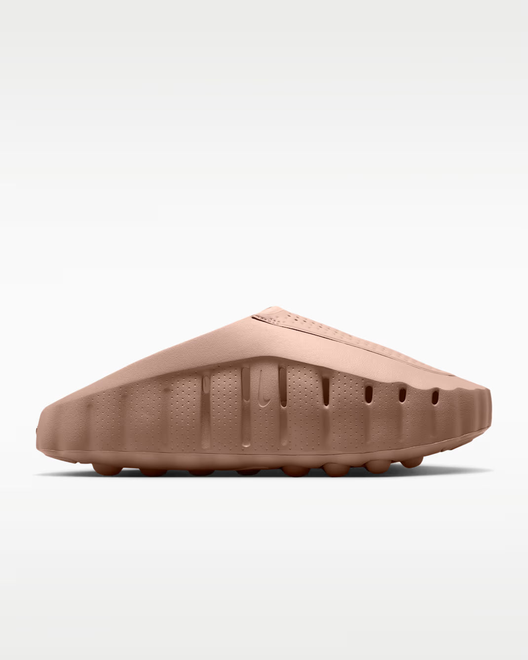 A side view of a mauve Mind 001 comfort slip-on sandal by Machina Wearable Technology, featuring a perforated upper and a textured, lugged sole.