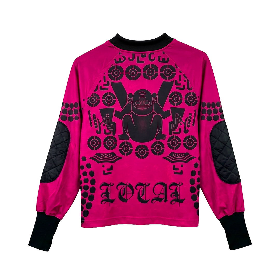 The Guerrero Mexicano LS by Machina - Wearable Technology is a magenta long-sleeve shirt with black cuffs, quilted elbow patches, and a bold black frog graphic with geometric symbols and "LOCAL" printed at the bottom.