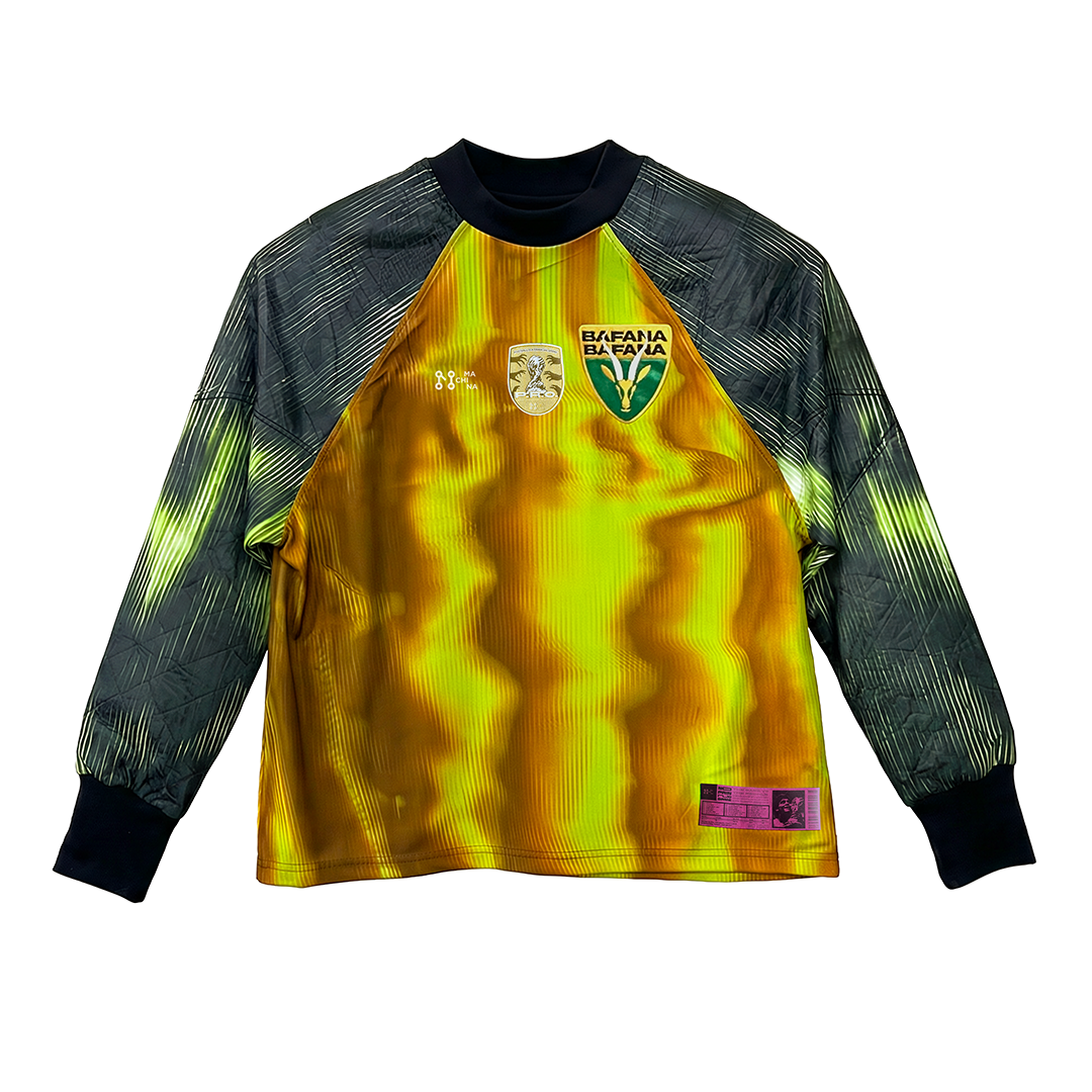 The BAFANA BAFANA long-sleeve soccer jersey by Machina - Wearable Technology features a gold and black wavy pattern, textured black sleeves, and the BAFANA BAFANA crest, honoring South African football and the 2010 FIFA World Cup.