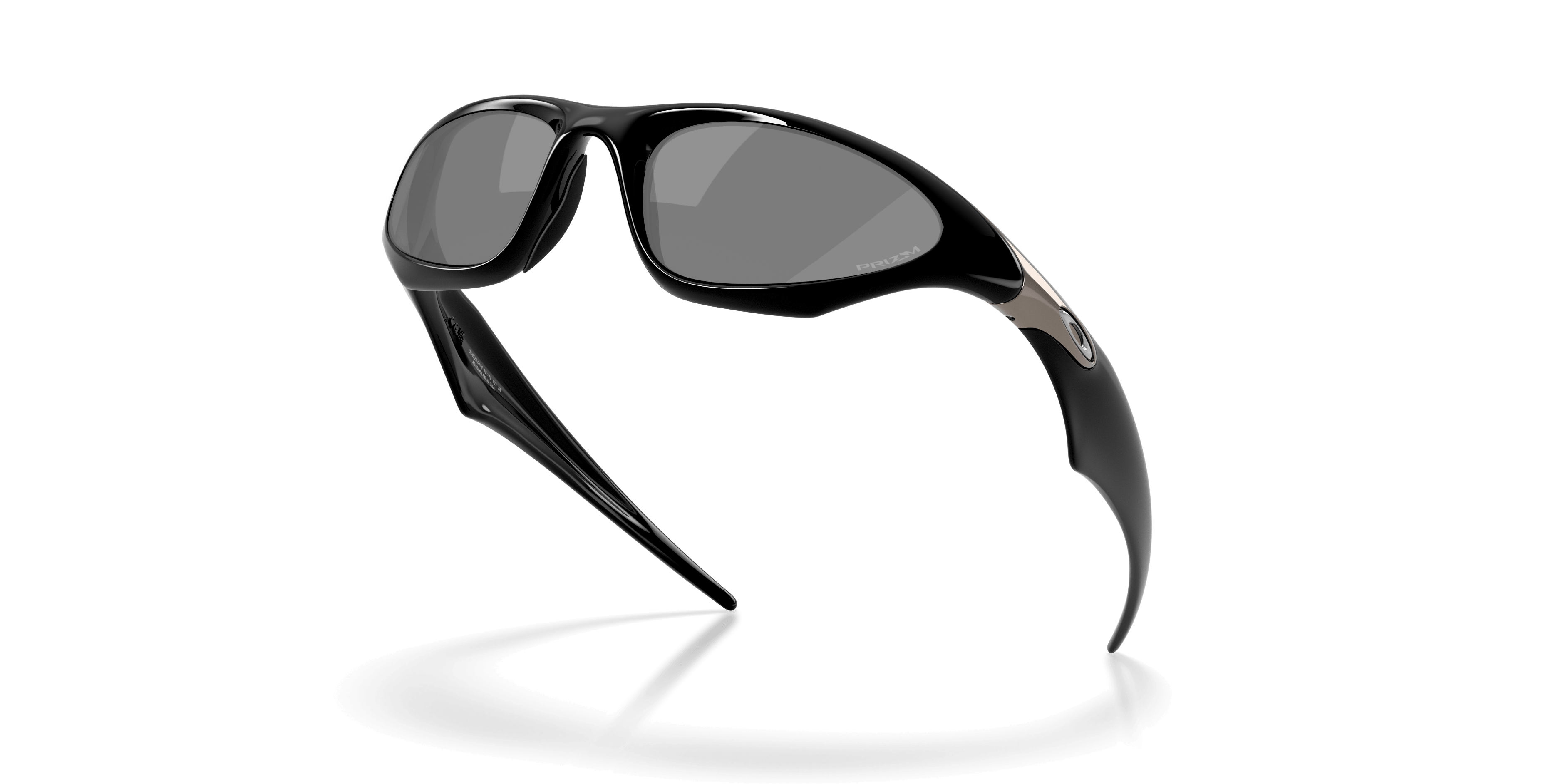 LIMITED-EDITION OAKLEY® MUZM SCAR by Machina - Wearable Technology: sleek black sunglasses with large, curved Prizm Black lenses and aerodynamic arms, floating stylishly against a white backdrop.