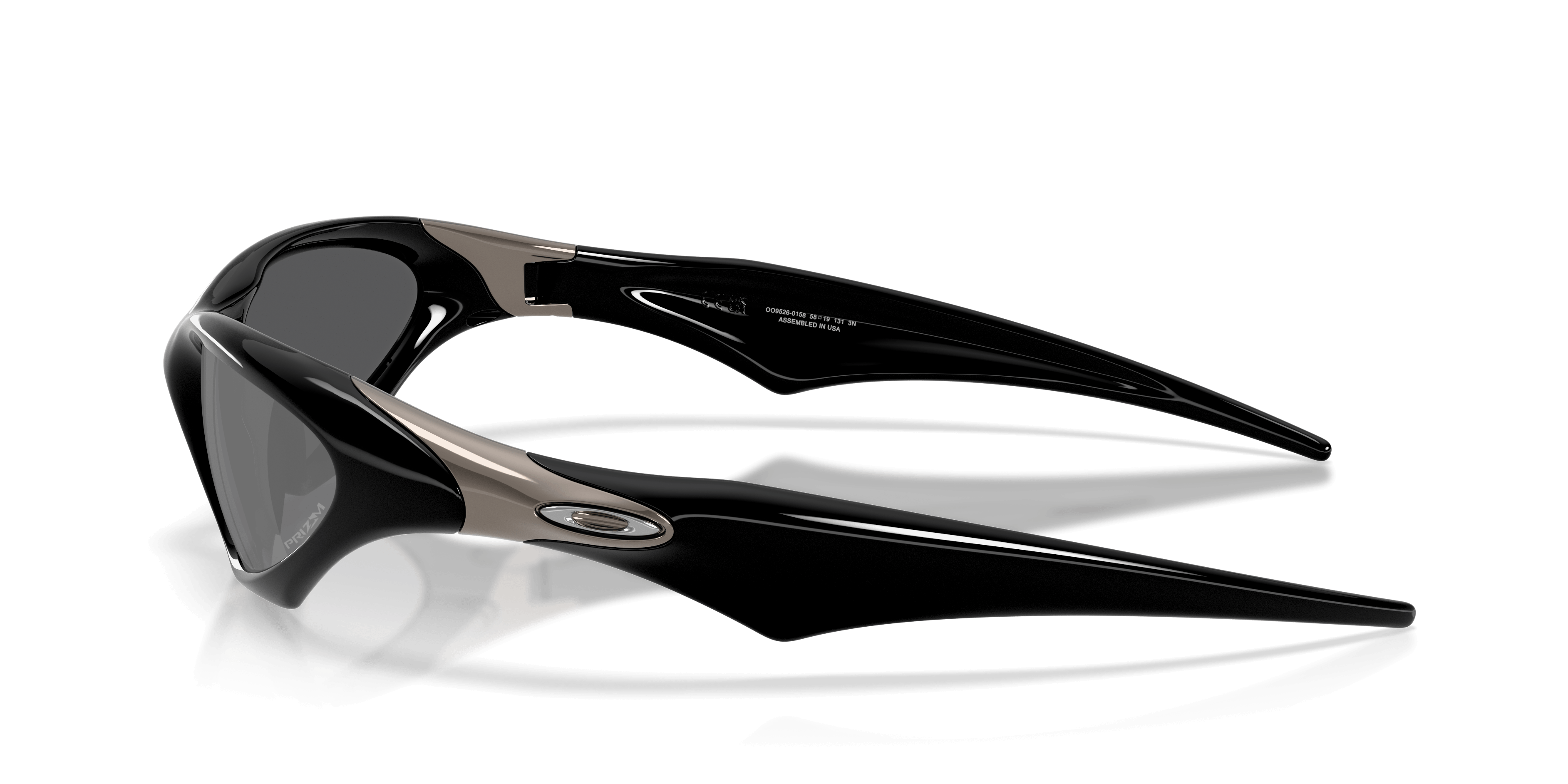 The LIMITED-EDITION OAKLEY® MUZM SCAR by Machina - Wearable Technology are futuristic black high-wrap sunglasses with pointed, angular arms, metallic accents, and Prizm Black lenses, shown on a white background.