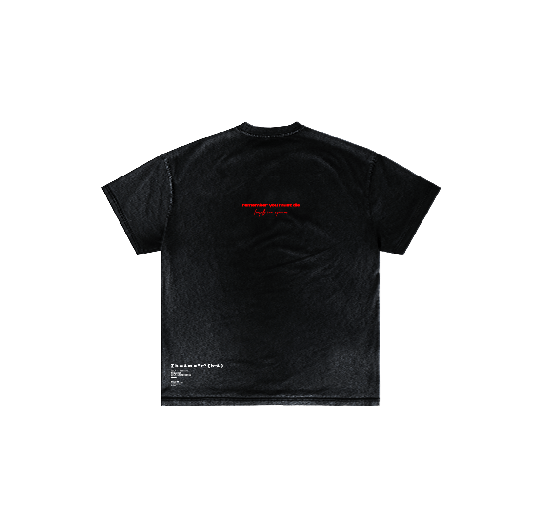 The Remember you must die shirt by Machina - Wearable Technology is shown laid flat, back facing up. Made from luxury cotton, it features subtle red text at the top center and white text at the bottom left, with a minimalist, graphic-free design.