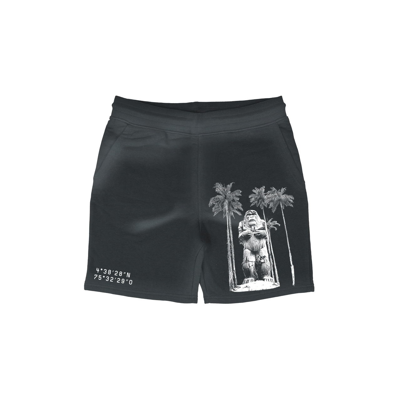 Discover the Cocora Guardian Shorts in elegant black, crafted from soft French terry cotton by Machina - Wearable Technology. These shorts boast a striking white print of a statue nestled between palm trees. The coordinates 4°3828N 75°3229O are intriguingly placed on the bottom left side, sparking adventures worthy of Bigfoot legends.