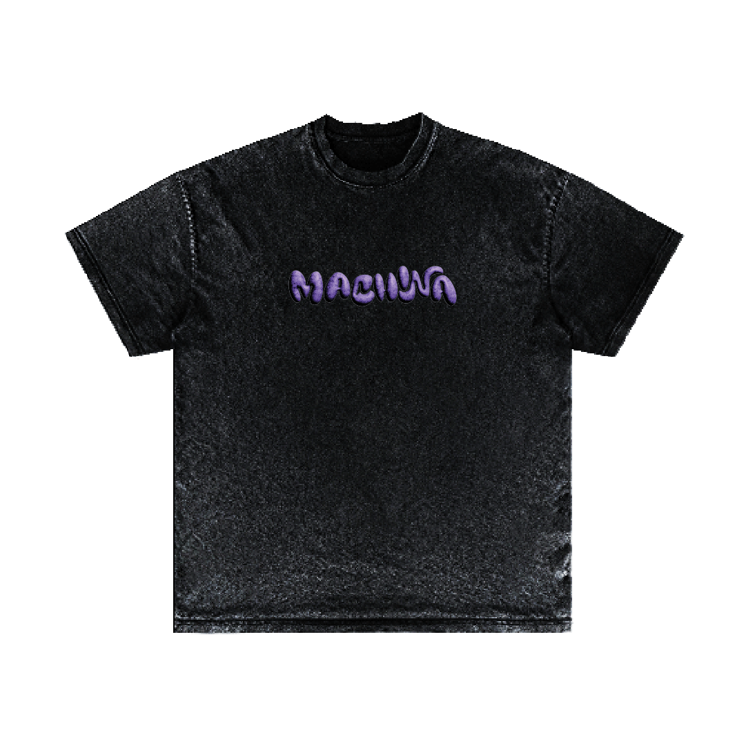 A black T-shirt from Machina - Wearable Technology called "Spine," featuring a textured fabric with the word MAGNUM in stylized, puffy purple lettering across the chest, inspired by cryptid science and the enigmatic allure of Bigfoot.