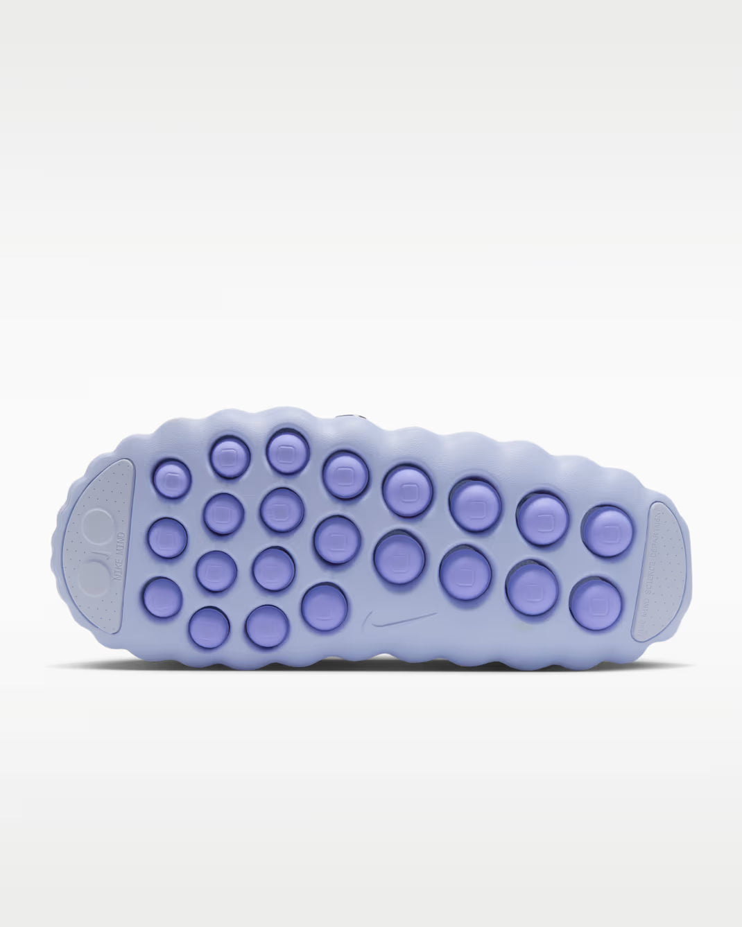 Light purple sole of the Mind 001 by Machina Wearable Technology, featuring a pattern of circular raised grips designed for comfort footwear.