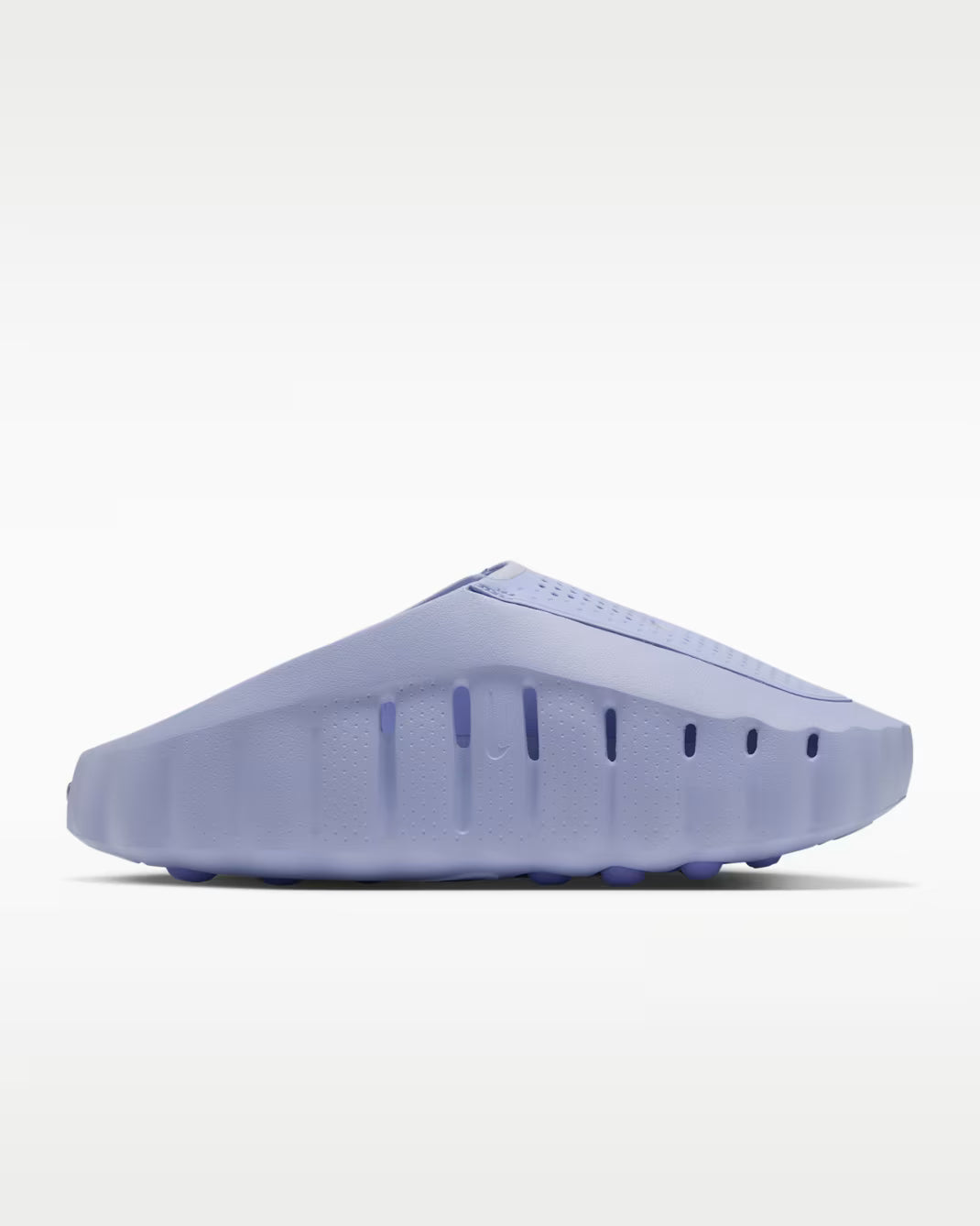 Mind 001 periwinkle slide sandal by Machina Wearable Technology with a perforated upper and a thick, textured sole, designed as comfortable footwear.