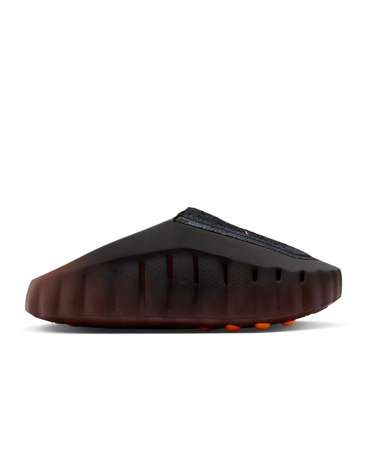 The Machina Wearable Technology Mind 001 Flyknit Bronze Eclipse features a slip-on design with a black upper, thick ridged dark brown sole, small orange accents underneath, and a futuristic minimalist look.