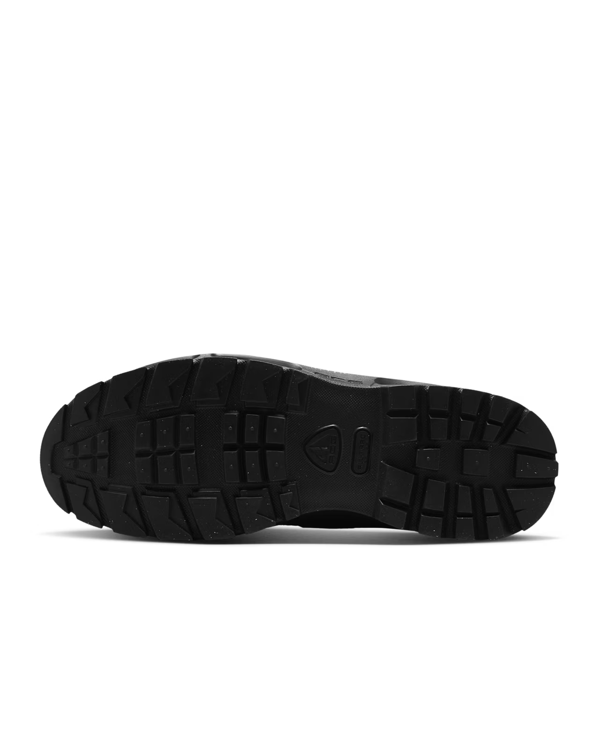 The image displays the black rubber outsole of a pair of Air Max Goadome Low [ Black ] sneakers from Machina Wearable Technology, showcasing rugged, multidirectional treads engineered for optimal traction and durability. Captured from a direct bottom view against a plain white background, this distinctive sole delivers reliable grip and features integrated Air cushioning by Machina for enhanced comfort with every step.