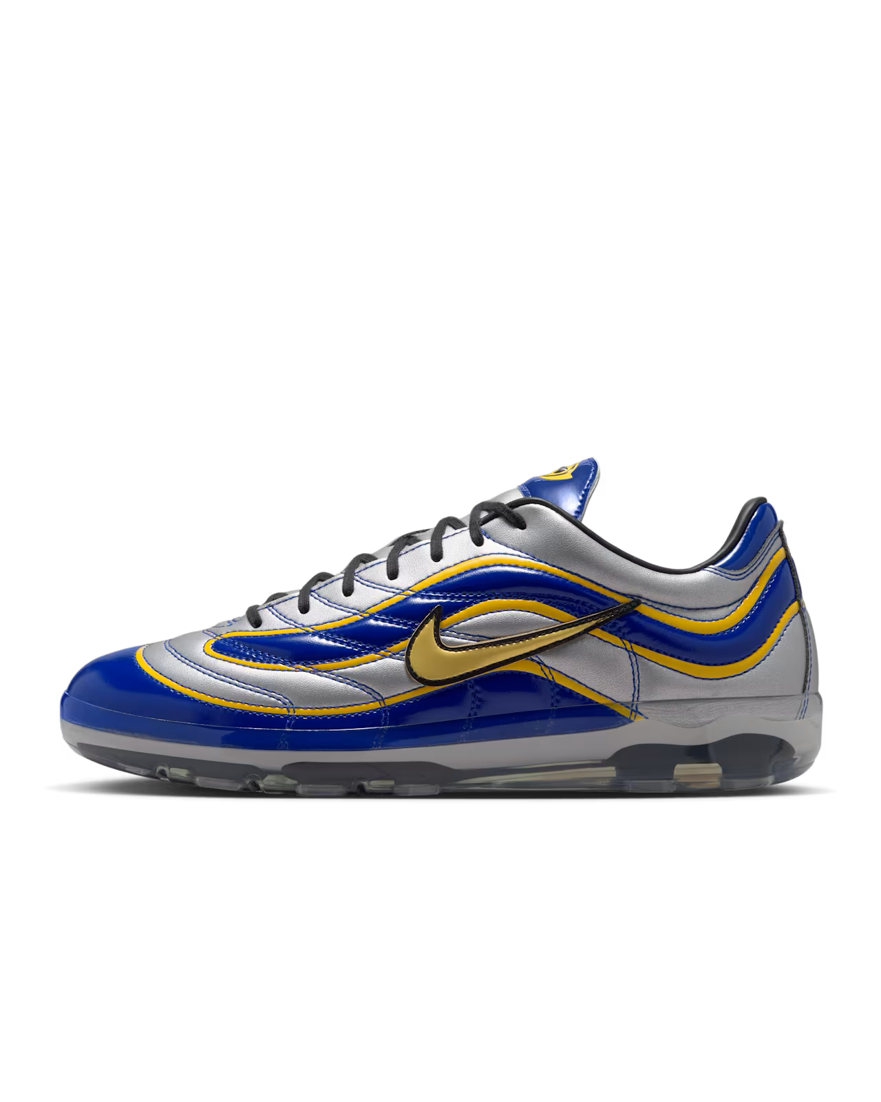 A side view of a Cryoshot Mercurial Vapor R9 OG / PACOTE sneaker by Machina Wearable Technology in metallic silver, blue, and yellow with a gold accent, black laces, and a translucent sole—an online exclusive inspired by the bold energy of the MACHINA BRAZIL JERSEY.