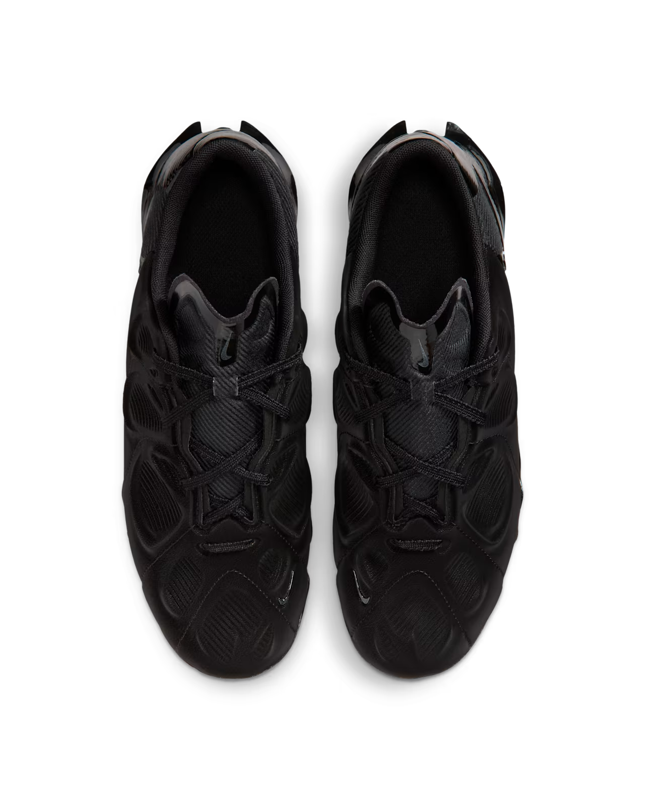Top view of a pair of Machina Wearable Technology Nike First Sight Mirage Black and Flash Crimson sneakers with a geometric design, black laces, and cleat-inspired platform, placed side by side on a white background.