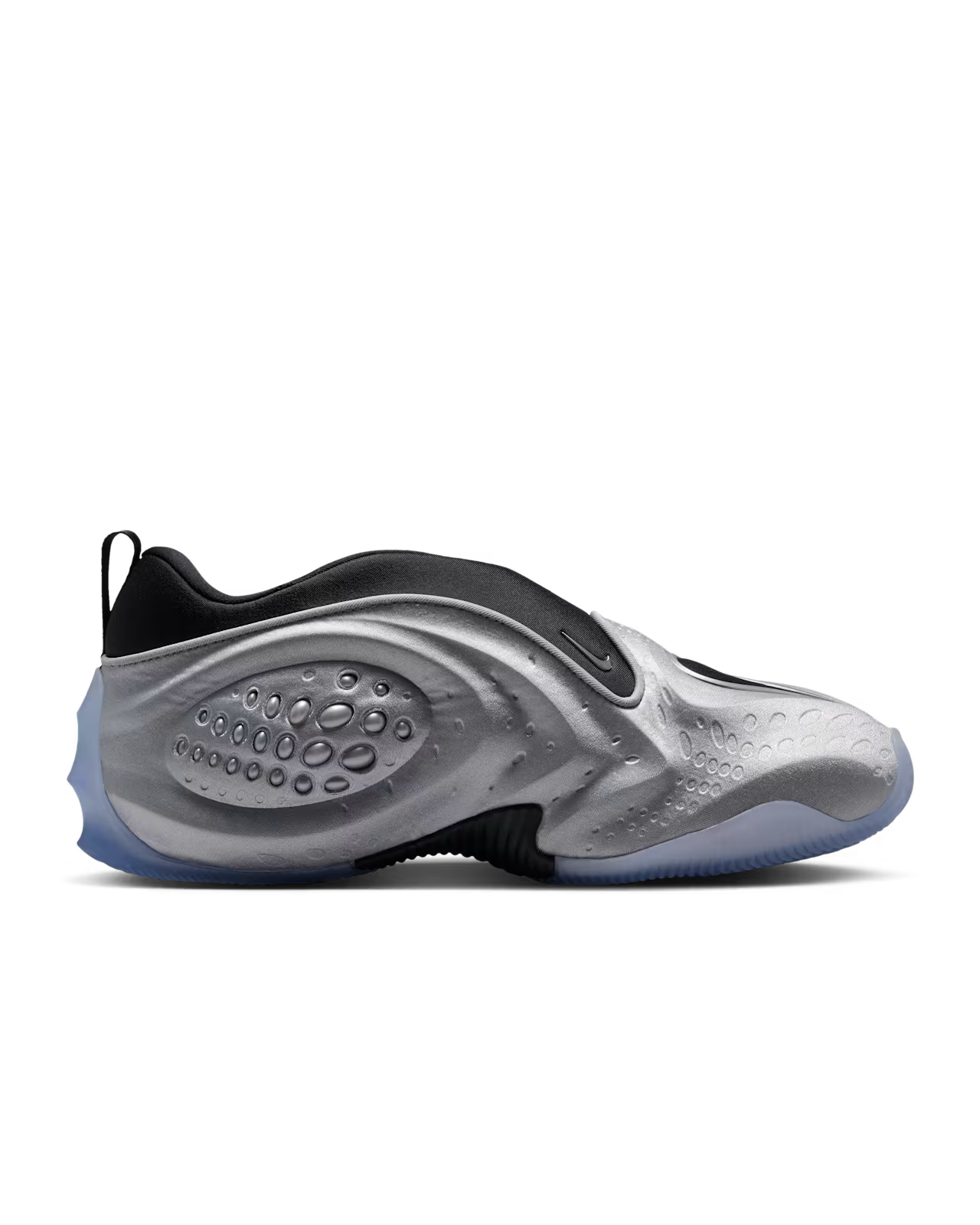 A side view of the Machina Wearable Technology First Sight Shadow Low in Metallic Silver and Black highlights this modern women’s lifestyle footwear, featuring textured, wavy detailing, a subtle Machina logo, and an icy blue translucent sole.