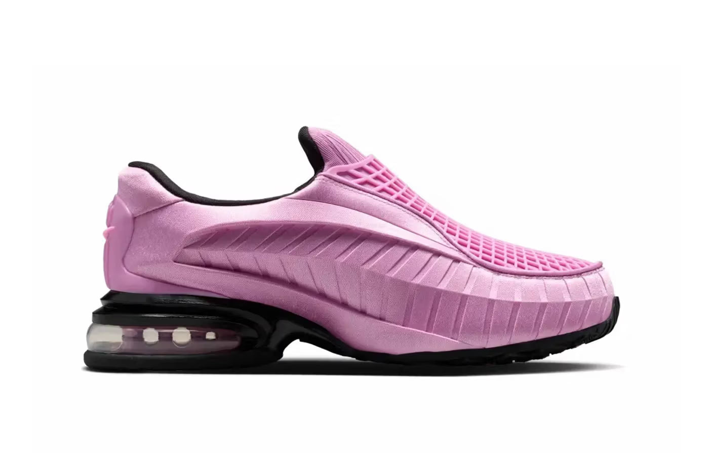 Experience the Machina Wearable Technology Nike Air Max Dolce "Light Magenta," a futuristic pink lifestyle sneaker featuring a thick, sculpted sole and visible heel air cushion, with textured details, slip-on design, and a contrasting black outsole.