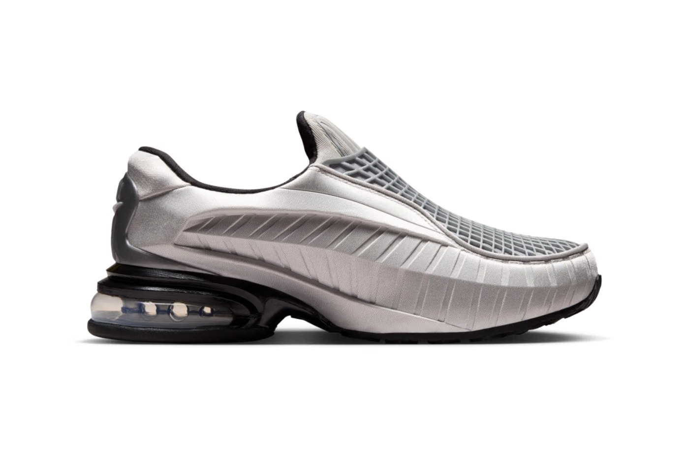 The Machina Wearable Technology Nike Air Max Dolce “Metallic Silver” showcases a textured silver and black upper, designed as a versatile lifestyle sneaker with a thick sole and visible heel air cushioning, displayed in side profile on a white background.