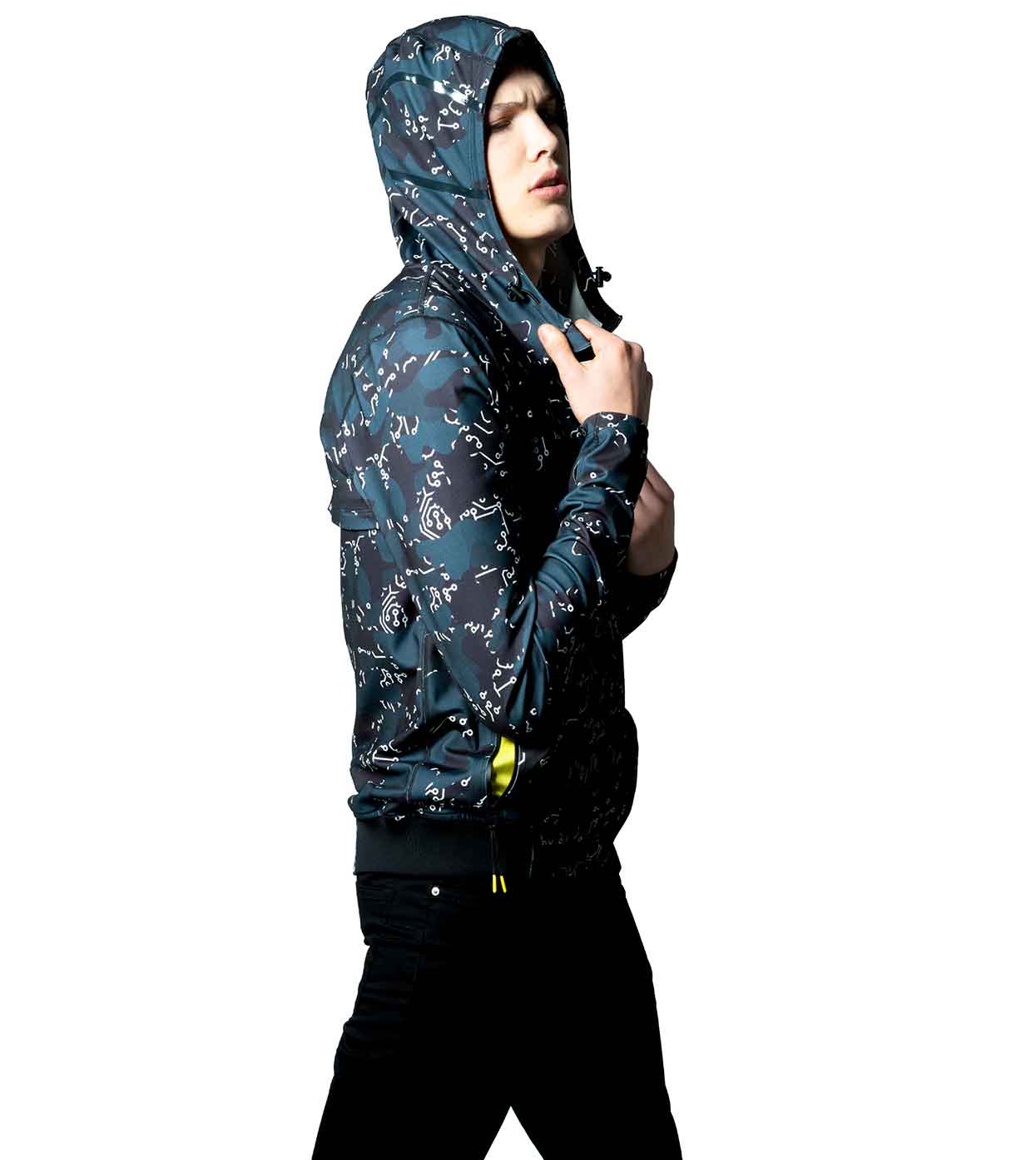 A person wearing the ELECTRIC WHITE HOODIE by Machina - Wearable Technology pulls the hood over their head. The individual stands in profile against a plain white background, showcasing an assertive expression that reflects cutting-edge fashion tech.